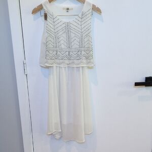 White Sleeveless Dress with Embellished Top
